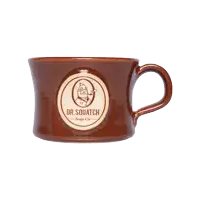 a brown mug with a logo for dr. squatch soup co.