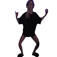 a woman wearing headphones and a black shirt is dancing in front of a white background