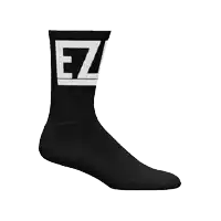 a pair of black and white socks with the letter ez on it