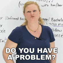 a woman stands in front of a white board with the words do you have a problem