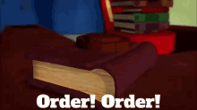 a book is sitting on a table with the words order order written on it
