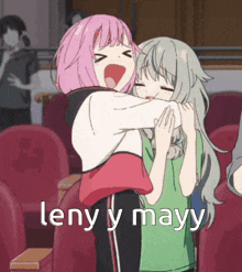 two anime girls are hugging each other with the words leny y mayy in the corner