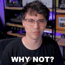 a man wearing glasses is making a face and says why not