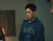 a blurry photo of a person standing in a room