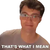 a man wearing glasses is smiling and says that 's what i mean