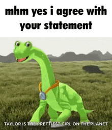 a green dinosaur is walking through a grassy field with a collar around its neck .