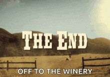 a sign that says the end off to the winery in a field