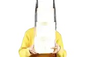 a man wearing a yellow sweater is holding a clear container