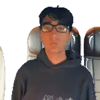 a pixelated image of a man wearing glasses and a sweatshirt that says ' ea ' on it