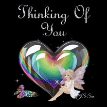 a card that says thinking of you with a heart