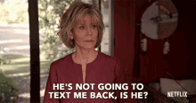 a woman in a red top says he 's not going to text me back is he