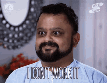 a man with a beard says " i don t work it "