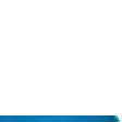 two footballs are flying in the air on a blue surface with a white background .