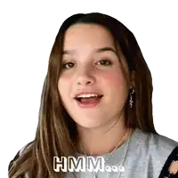 a girl with a snake earring and the words hmm on her face