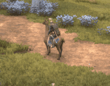 a man in a knight 's outfit is riding a camel in a video game