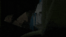 a painting of a monster with sharp teeth looking at a person