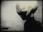 a black and white photo of a person with a large head and a date of 25 dec
