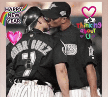 two baseball players kissing with the words happy new year thinking about u.
