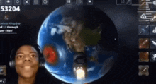 a person wearing headphones looks at a globe with the number 53204 on it