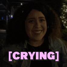 a woman in a dark room with the word crying above her