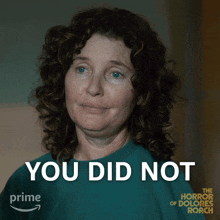 a woman with curly hair says you did not