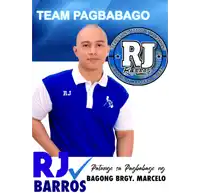 a man in a blue shirt with the name rj on the front