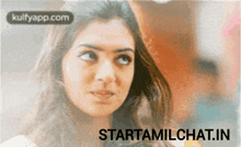 a blurred image of a woman with the website starttamilchat.in visible