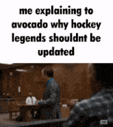 a man in a suit is explaining why hockey legends shouldn t be updated