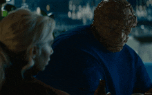 a man in a blue shirt is talking to a woman with the caption kepler