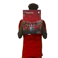 a man in a t-mobile shirt holds up a calendar