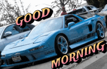 a blue sports car is parked on the side of the road and says good morning on the bottom